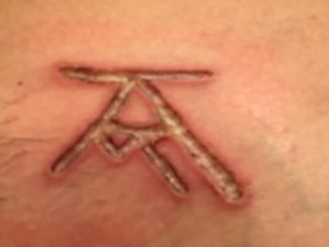 Branding with the initials KR and AM on the DOS slaves