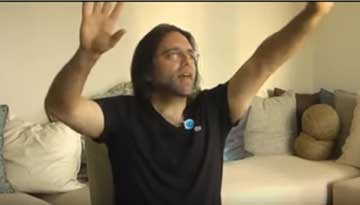 Keith Raniere, teaching ethics, has an emotive moment on camera.