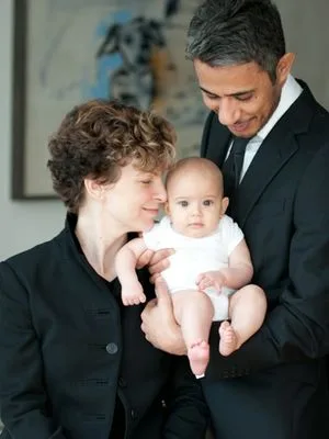 Sara Bronfman and Abdul Basit Igtet with their daughter. Will she branded and placed on a 500 calorie diet when she gets older? When she gets to be around 13 will they entrust Mr. Raniere to mentor her one on one?