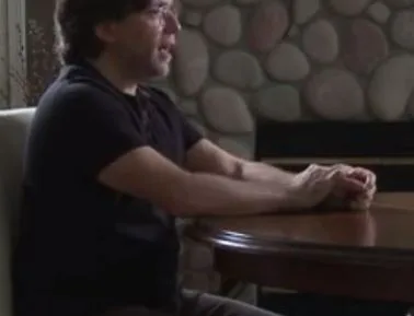 “Tubby” Raniere uses hands to make his points on all levels —