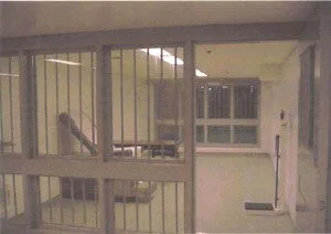 The MDC visiting room makes it tough for people  to communicate their needs for their appeal.