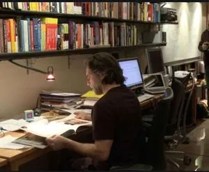 Keith Raniere in his library at 8 Hale Dr.