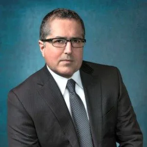 At the sentencing hearing of Keith Alan Raniere, his attorney, Marc Agnifilo admitted to the judge that Raniere had started an intimate relationship with Camila when she was 15. He was 45.