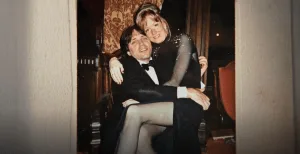 When he wasn't kissing women he would have them sit on his lap. Here he is with one of his girlfriends, Barbara Bouchey. She left him in 2009 and he went after her with a vengeance seeking to destroy her life. He got her indicted. He sued her 14 times. He even tried to lure her to Mexico where he set up a scheme to imprison her.  She managed to survive this onslaught, from the man who loves so much.