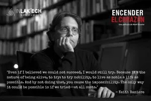 Keith Raniere, in 'The Thinker' pose, poses in front of a library of books and near a computer screen. The quote attributed to him in the picture is a sterling example of his ability to emit complete bullshit at every moment of his career.