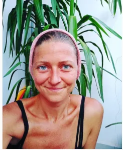 Sahajo Haertel, a DOS slave and Rainbow nanny. Said to be still an active member of DOS, Nxivm, and Rainbow. She teaches children German.