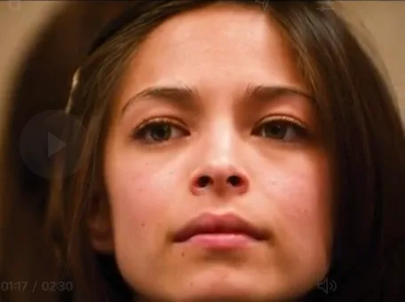 Kristin Kreuk at 2009 NXIVM event with Native American actor Russell Means – as Allison Mack falls asleep