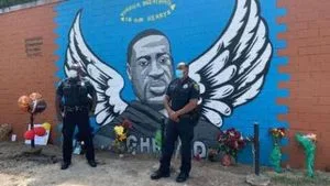 George Floyd died at the hands of the police. He happened to have COVID-19. It might have had an impact on his ability to breathe, but the fact of a murderous policeman having his knee on his neck for almost 9 minutes probably had a greater impact.