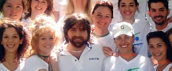 Keith Raniere with some of his followers.