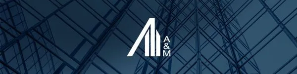 A&M company logo centered on a dark blue glass building backdrop.