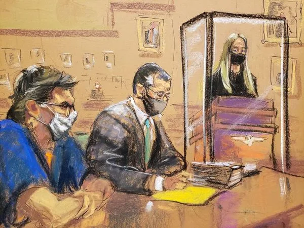 In this courtroom sketch India Oxenberg gives a victim impact statement at the sentencing hearing of Keith Raniere. Raniere sits with his lawyer Marc Agnifilo inside the Brooklyn Federal Courthouse, on October 27, 2020, Judge Nicholas G. Garaufis presiding.  REUTERS/Jane Rosenberg