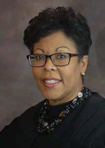 Oklahoma Judge Aletia Timmons’ Grudge Against Moshe Tal Leads to Unjust $1.6M Payday for Andrew Hedrick