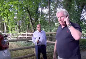 Investigative reporter Wayne Dolcefino confronted Chris Ambrose. This is the grounds of the house where he keeps guard over the children.