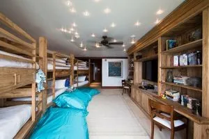 For the plebes in the Nxivm group - they had to share a room with bunk beds