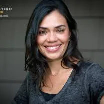 Monica Duran is a slave of Mr. Raniere's and provides her skills in fashion and design in harmonizing the world of DOS.