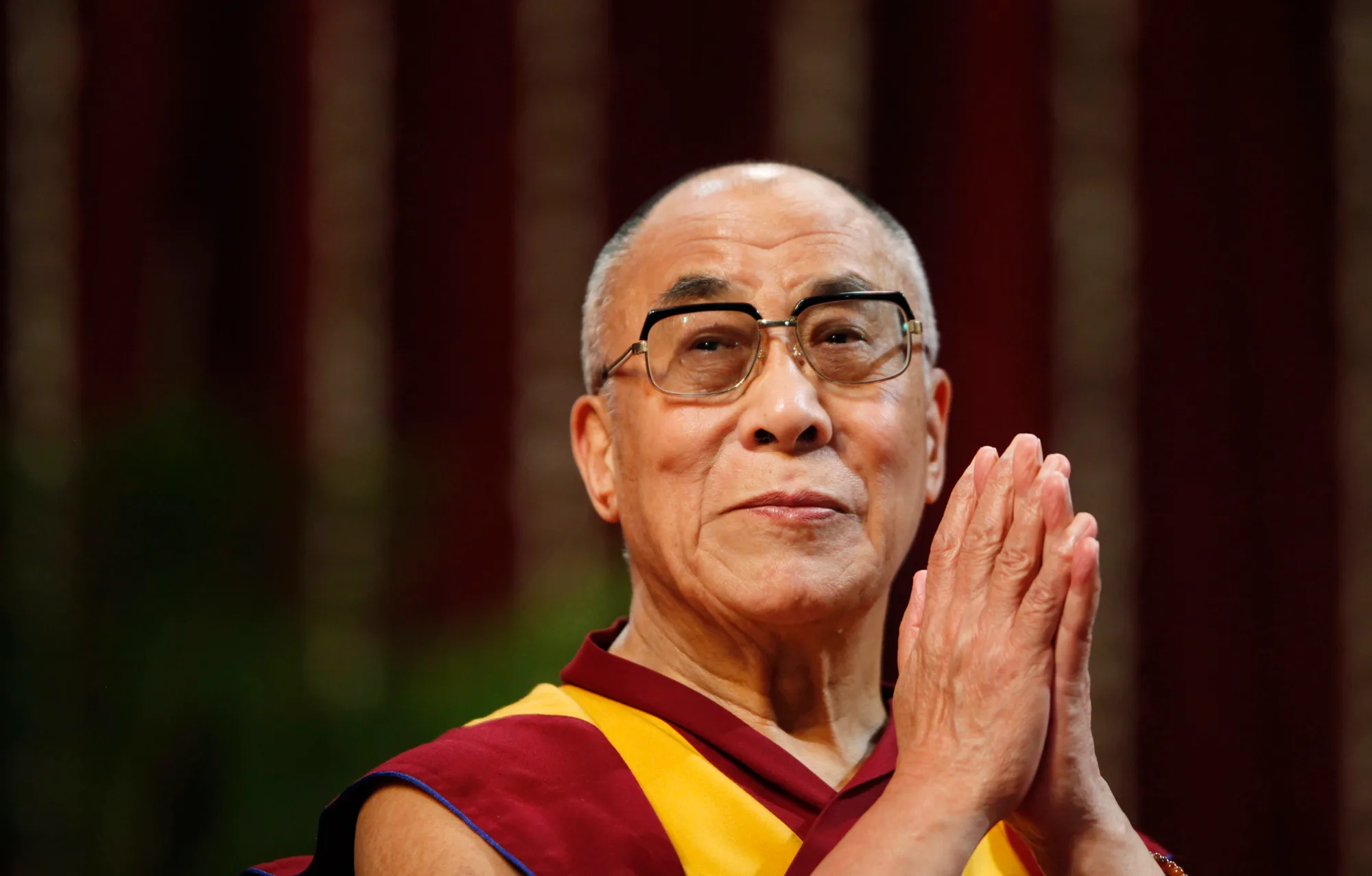 Readers: Dalai Lama lost respect by associating with Raniere
