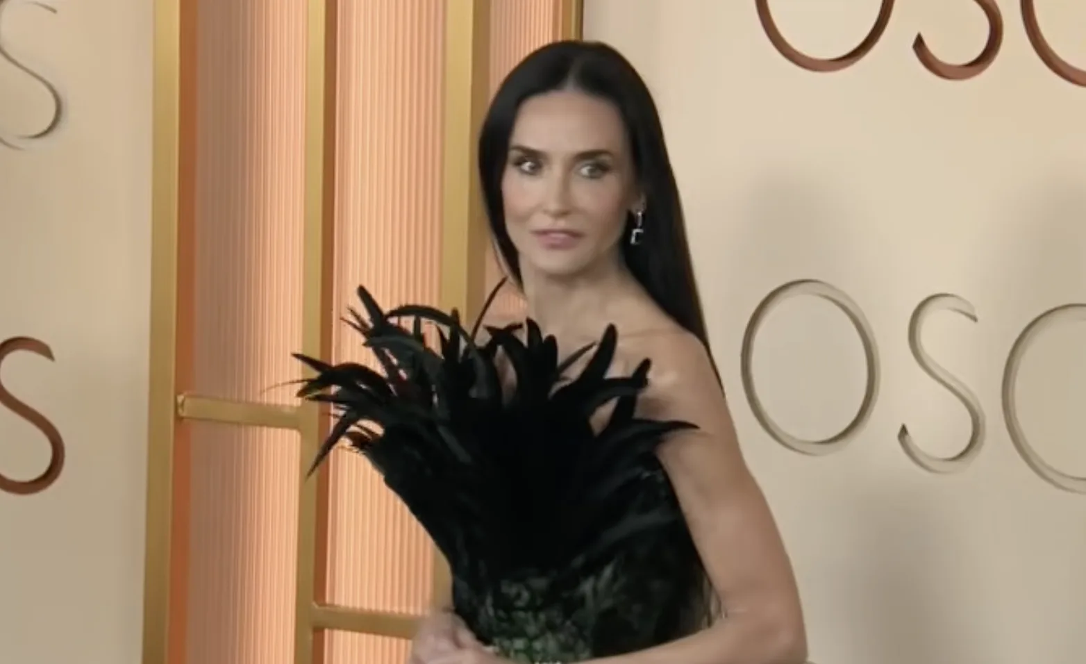 Demi Moore Just Wore The Most Dramatic Dress On The 2026 Oscars Red Carpet And It Is Covered Head To Toe In Feathers