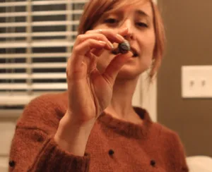 From Pimp to Shining Pimp? Allison has a stone in her hand. Is it one that Pam passed on to her?