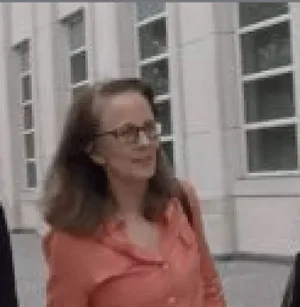 Kathy Russell, 61, was 13 years younger when self-proclaimed scientist and ethicist Keith Alan Raniere had her take her clothes off and photographed her for his studies.