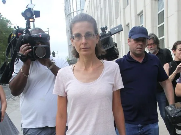 Clare Bronfman walks out of court. The judge gave her three days to put her bail package together.