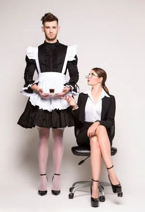 Society of Protectors male [left] in his traditional SOP uniform.