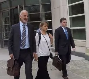 Allison Mack with her lawyers William F. McGovern [l] and Sean S. Buckley [r]. “Prior to her arrest on the instant charges, Ms. Mack had no criminal history,” Mack’s lawyers said in a letter in August, 2018. “While the instant charges have deprived her of pursuing her acting career, Ms. Mack nevertheless is interested in contributing to society." In April 2019, she pleaded guilty to two felonies -- racketeering and racketeering conspiracy. The most serious charge against her -- sex trafficking was dropped in exchange for her plea deal.
