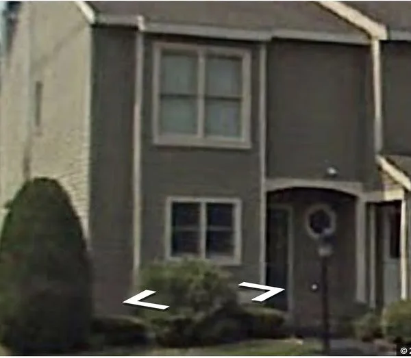 The townhouse at 8 Hale Drive in Halfmoon, New York was the target of an FBI raid on March 27, 2018. It is now for sale