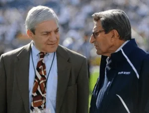 President Graham Spanier and head coach Joe Paterno talk before the Iowa game, Oct. 8, 2011. In one month the idiot board of trustees threw both of these innocent men under the bus.