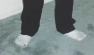 Keith Raniere's feet.