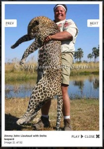 Jimmy John (right) embraces a Delta Leopard he apparently killed in 2010. 
