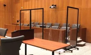 A jury box is surrounded in plexiglass at an Eastern District of New York courtroom in Brooklyn. Photo: Courtesy of EDNY