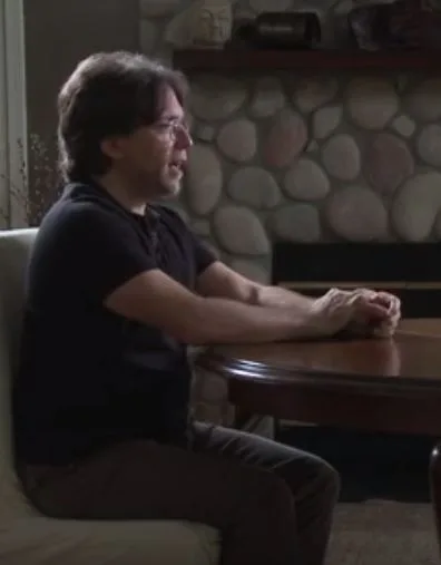 “Tubby” Raniere uses hands to make his points on all levels —