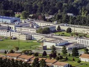 FILE - An aerial view captures the Danbury Connecticut Federal Correctional Institute Sept. 24, 2004. Two U.S. senators Chris Murphy and Richard Blumenthal said Wednesday, Jan. 26, 2022, they were denied access to major parts of the prison while trying to examine conditions there. (AP Photo/Douglas Healey, File)