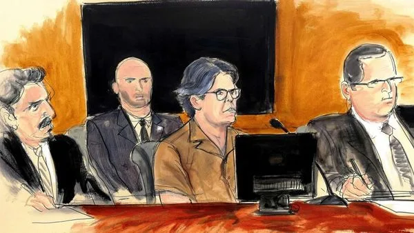 This remarkable sketch includes Keith in a brown 'coat of many colors' flanked by his lawyers, Paul DerOhannesian [l] and Marc Agnifilio [r]. The grim but determined look of the Vanguard shows his steely resolve and the clear awareness that the case against him is an entire fabrication. He will fight for justice and win, even if it takes the rest of his life.