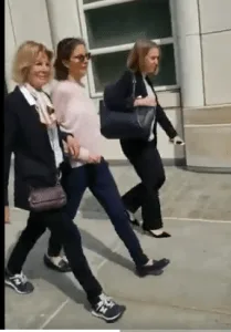 Clare Bronfman [center] with her mother, Georgiana Havers, and attorney, Kathleen E. Cassidy.