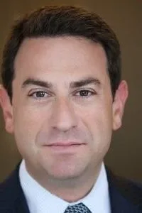 Judge Eric Komittee