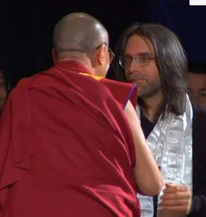 The Dalai Lama greets Keith Alan Raniere AKA Vanguard