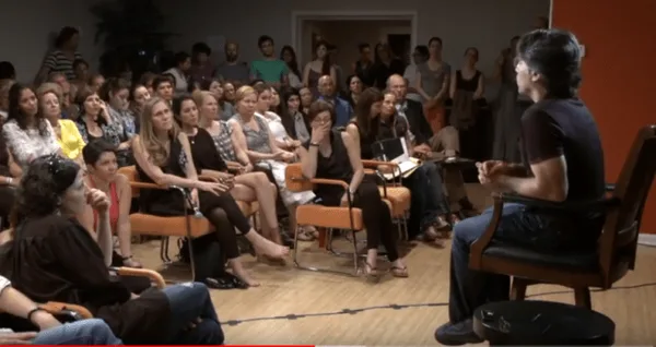 Keith Raniere teaches a group of his followers during his Nxivm days.