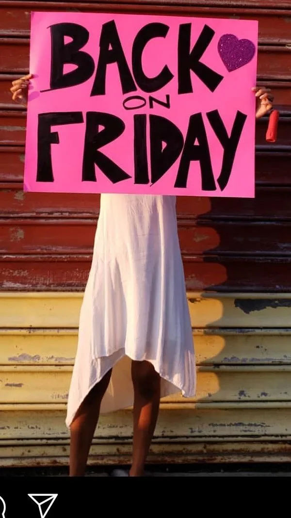 On July 25, Michele Hatchette, wearing a white dress formerly worn by Allison Mack, holds up a sign announcing that the Forgotten Ones will not be dancing again until the next Friday, July 31