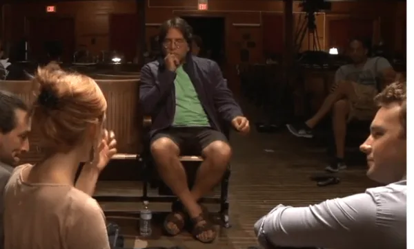 Mark Hildreth [right] sits, along with fellow Nxivm leader Allison Mack, at the feet of the master Keith Alan Raniere.