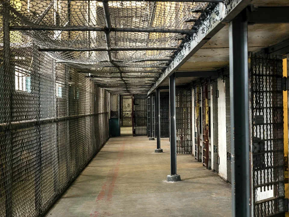 Prison guards where Raniere resides might make it hard for him to be Vanguard