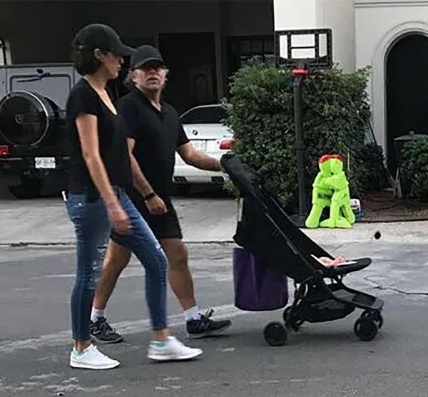 Mariana and Keith Raniere with their son in 2017.
