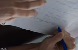 From the Netflix film Orgasm Inc, Audrey Wright, a former OneTaste student, is filmed talking to an FBI agent as she writes the name "McGinnis."