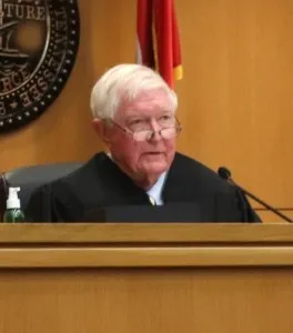 Judge Acree runs a courtroom that some have called a bit marsupial.
