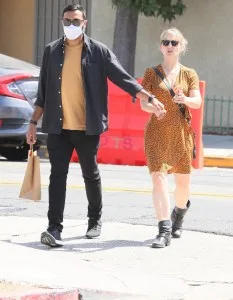 Most recent public photos of Allison Mack (with an unknown friend) shortly before she surrendered to Dublin.