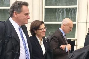 Nancy Salzman, with her lawyers David Stern [l] and Robert Soloway [r].