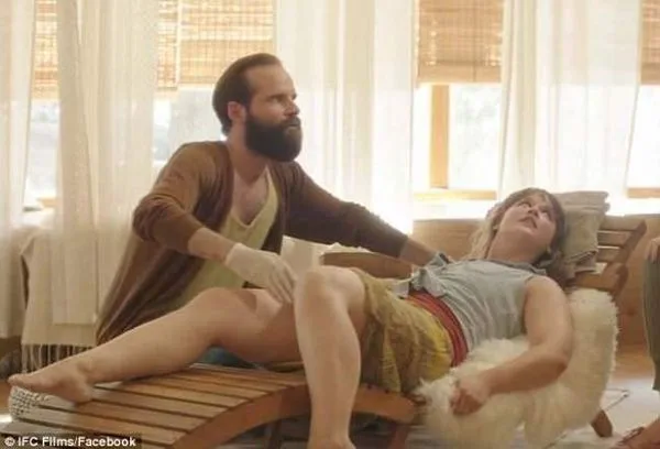 A stroker with his rubber glove and the strokee. In order to lead women to enter the world of sex slavery - the woman [Strokee] lays naked from the waist down, legs spread eagle, on pillows with a blanket over her. The man (stroker) sits fully clothed in front of her. He puts one finger from his gloved hand at the entrance of her vagina and uses another finger to stroke the upper left quadrant of the clitoris up and down for a timed 15 minutes. The stroker and strokee are called Research Partners. During the fingering, the man verbalizes the physical details of what he sees taking place with her body parts and the woman speaks to him about what it is she’s experiencing.