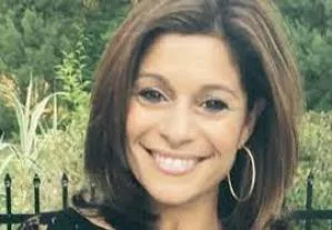 Debra Marino, grinning after selling Leonardo for $15,000