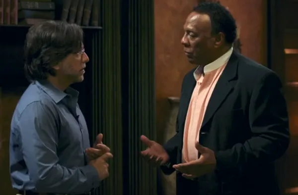 Keith Raniere shakes hands with his consultant - Richard Mays, a man who Raniere retained to use his connections to help indict his enemies.
