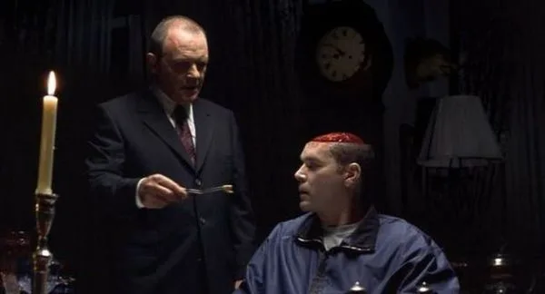 Hannibal Lecter offering friend Krendler a piece of his own brain.